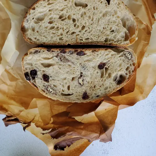Cranberry pecan sourdough loaf, sliced open
