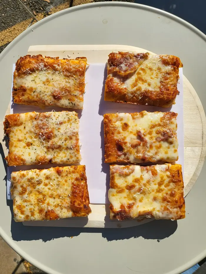 Sicilian-style sourdough pizza slices with a 72-hour fermented crust